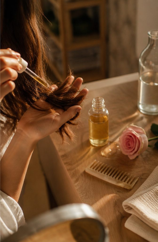 OUAI Hair Oil bottle pictured with a fresh floral scent article